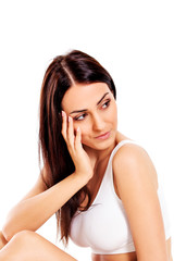 Fototapeta premium Portrait of beautiful fit girl in bra. Isolated on white.