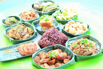 Sai Aua is name of northern Thai spicy sausage, in set of other foods at restaurant.