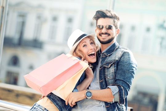 Happy Young Couple In Shopping