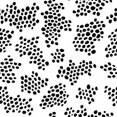 Black and white spots. Abstract seamless vector pattern