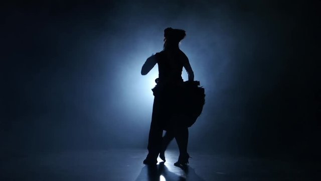 Emotional and graceful latinamerican dance performed by champions, smoky studio