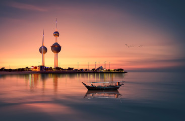 beautiful arabian boat in in front of kuwait tower during sunset - 142882199