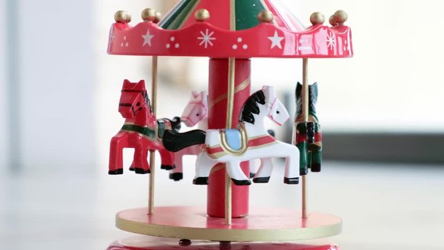 music box merry go round carousel horses toy closeup