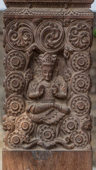 Fototapeta na wymiar Ancient Goddess Carved Wooden Pillar Nepal