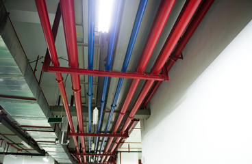ceiling of large modern storehouse.