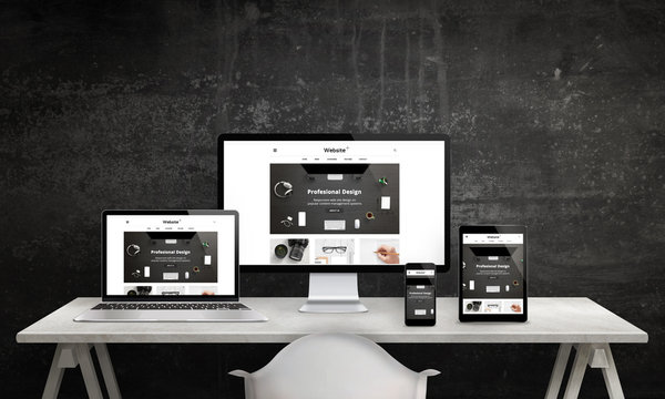 Responsive web site promotion on computer display, laptop, tablet and smart phone. Modern, clean web design. White office desk with devices, black wall in background.