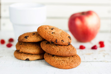 Chocolate cookies on a white background. Tasty breakfast