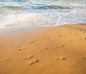 Footprints on the sand beach