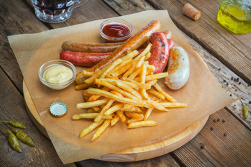 Portion of food French fries and sausages