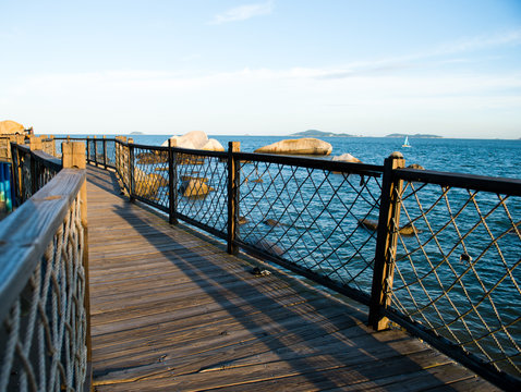 A wooden walkway on seaside.