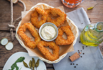 Squid rings in batter with sauce