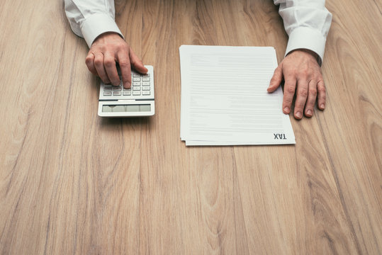 Businessman Checking Tax Forms