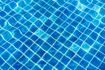 The blue water in the pool is clean.