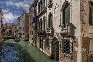 Fototapeta na wymiar Beautiful glimpse of the San Marco district on the Rio dei Barcaroli near the Frezzaria swimming pool, Venice, Italy