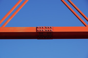 Details of a red modern bridge design and structure