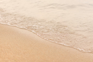 Fototapeta na wymiar Clean beaches and sea waves in the sun.