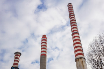 Industrial chimney urban scenery near at power plant