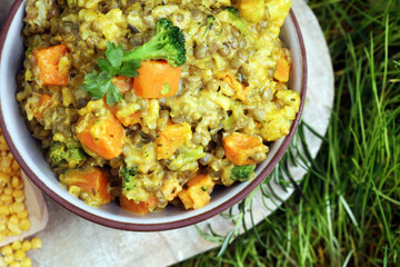 Lentil curry with carrot, cauliflower, broccoli and onion in a bowl. Healthy lifestyle. Diet menu