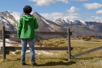 Fototapeta na wymiar hiker in the Pyrenees mountains in spring with snow