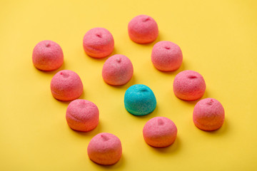 Fototapeta na wymiar photo of tasty colorful marshmallows on the wonderful yellow background