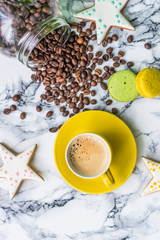 Still life with coffee and dessert on marble background