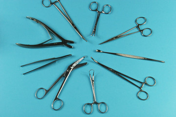 Surgical Instruments on blue background.