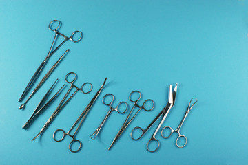Surgical Instruments on blue background.