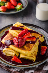 Filled pancakes with strawberries