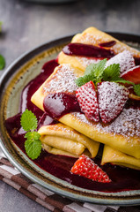 Filled pancakes with strawberries