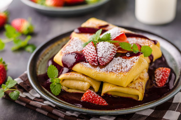 Filled pancakes with strawberries