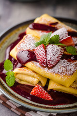 Filled pancakes with strawberries