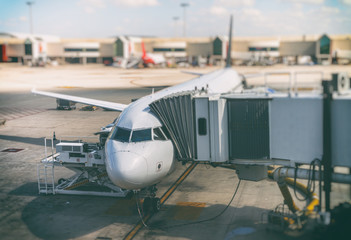 Passenger plane in the airport. Aircraft maintenance.