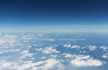 Aerial view of the mountains in the clouds.