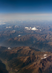 Aerial view of the mountains in the clouds.