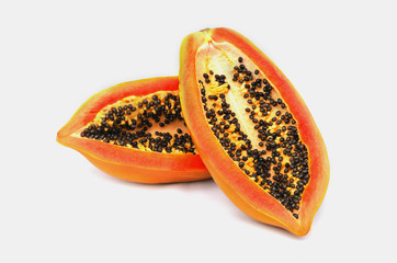 slices of sweet papaya on white background