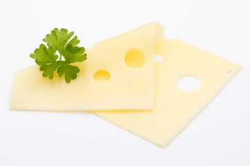 Cheese slices on white background cutout.