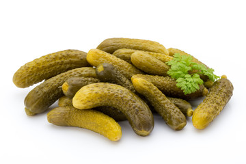 Marinated pickled cucumbers isolated on the white.