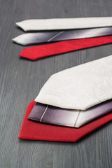 Tie on a dark wooden surface.