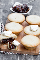 Mince  pie group on cutting board on wooden background