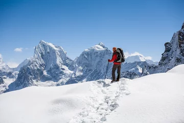 Printed kitchen splashbacks Mount Everest Trekker is walking by Renjo La pass in Everest region