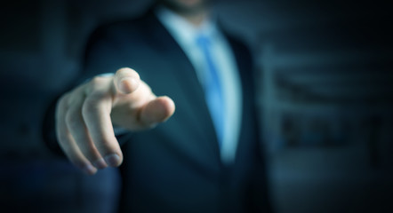 Businessman pointing his finger