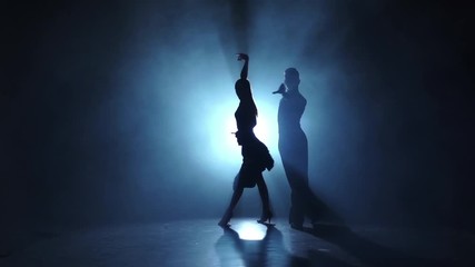 Emotional and graceful rumba dance performed by champions, slow motion