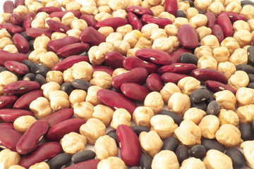 Mixed beans on white background - chickpea, kidney bean, and black bean