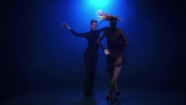 Emotional and graceful latin dance performed by champions, slow motion