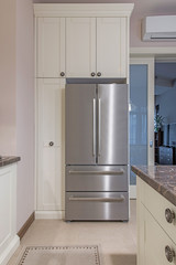 Stainless steel fridge in modern kitchen