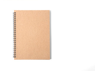 Top view of open spiral blank notebook  on white background