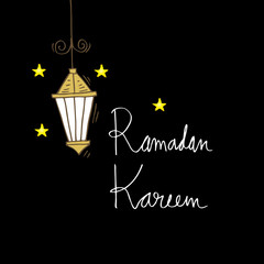 Ramadan kareem hand lettering with lantern.