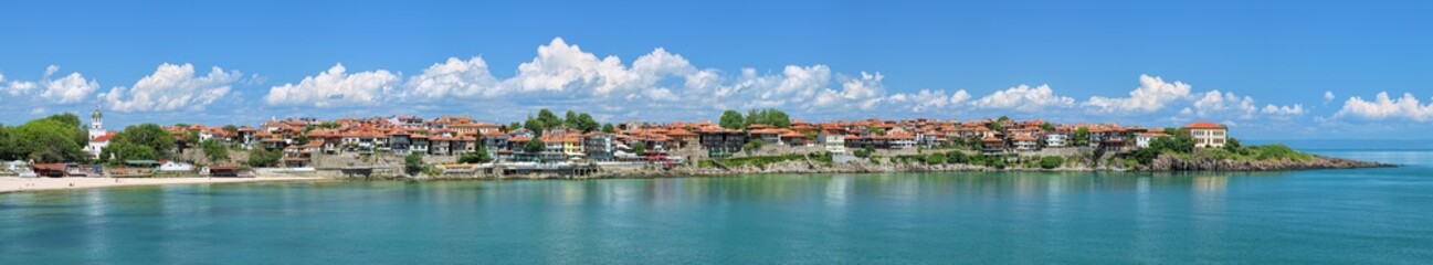 Naklejka na ściany i meble Panorama of Old Town of Sozopol, former ancient town of Apollonia, in Bulgaria. Sozopol is the famous seaside resort on the coast of Black Sea. Photo taken in spring before the start of high season.