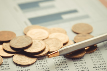 pile coin money with graph banking concept for background.concept in grow and walk step by step for success in business