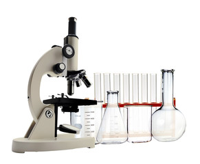 Laboratory metal microscope and test tubes with liquid isolated on white